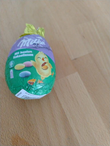 Milka Lustiges Ei Large Easter Egg filled with Chocolate Lentils